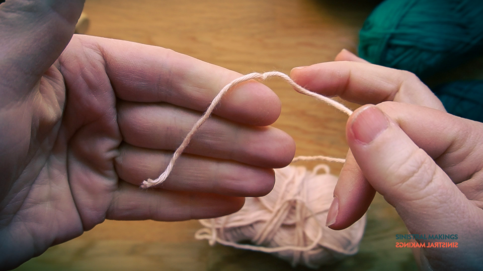 a) Pull out some yarn