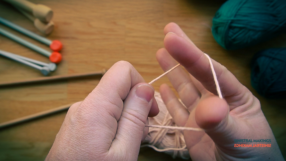 d) Hold taught with left hand